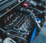 ASE-certified technician using diagnostic tools to evaluate engine performance issues and identify repair needs in Portland auto shop